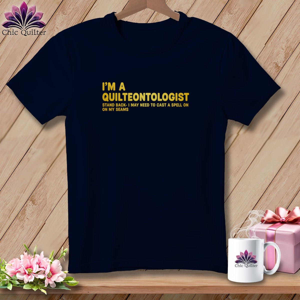 Navy t-shirt with "I'm a Quilteontologist" text and a funny quilting quote.