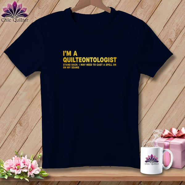 Navy t-shirt with "I'm a Quilteontologist" text and a funny quilting quote.