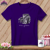 Purple t-shirt with armchair, quilt, and mug graphic; 