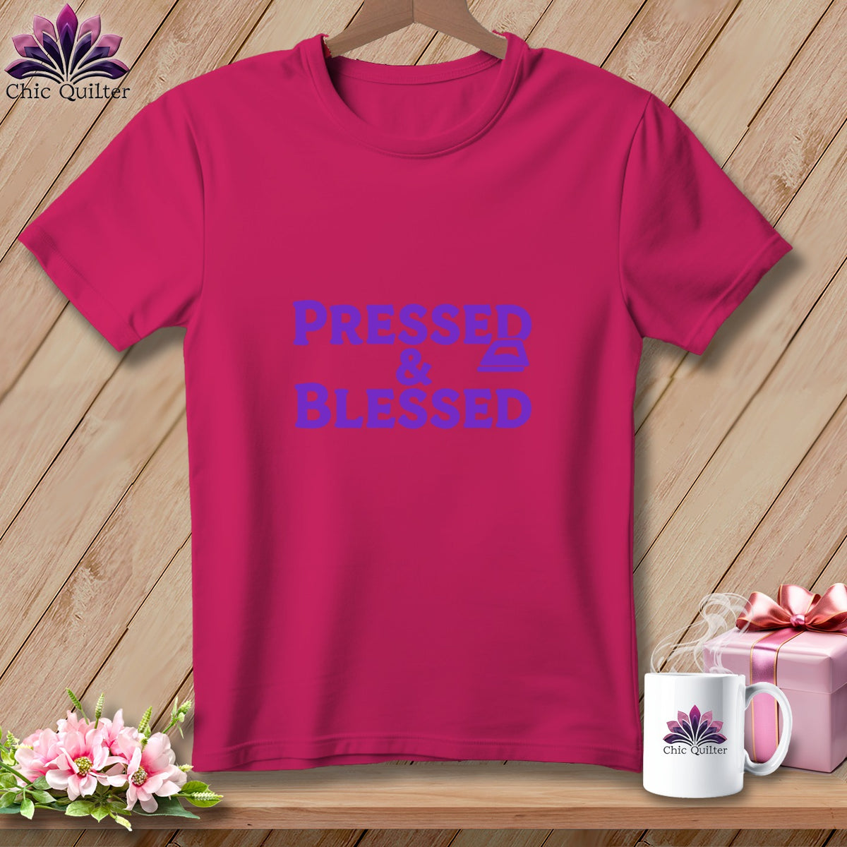 Pink t-shirt with "Pressed & Blessed" text and an iron icon.