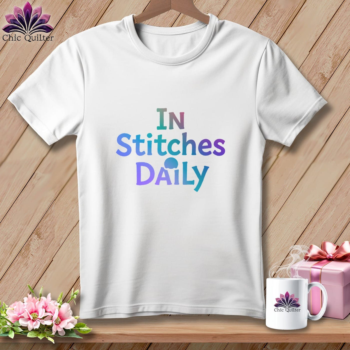 White t-shirt with gradient text "IN Stitches DAiLy" and Chic Quilter logo.