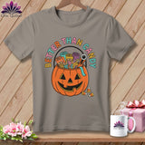Gray t-shirt with jack-o'-lantern filled with sewing supplies and text 