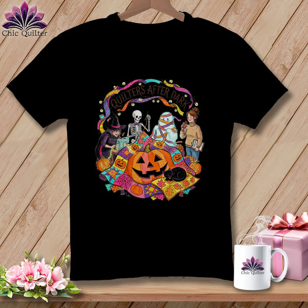 Black t-shirt with "Quilters After Dark" Halloween graphic featuring a skeleton and mummy sewing.