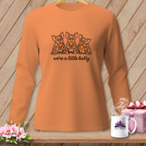 Orange long-sleeve shirt with bats drinking wine and text 