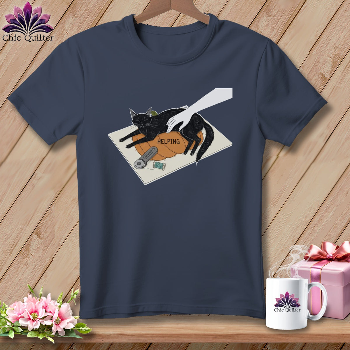 Black cat sitting on a pumpkin with the word HELPING and sewing notions.