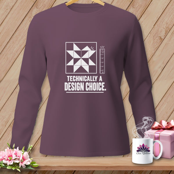 Purple long-sleeve shirt with white quilt block, ruler, and text.