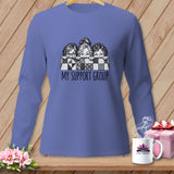 Long-sleeved shirt with sketch of three women over a quilt, text 