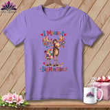 A purple short-sleeved t-shirt featuring a cartoon moose, quilts, hearts, and the text I Moose-t Buy More Fabric.