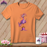 An orange t-shirt features a whimsical purple bird holding a needle while perched on a spool of thread.
