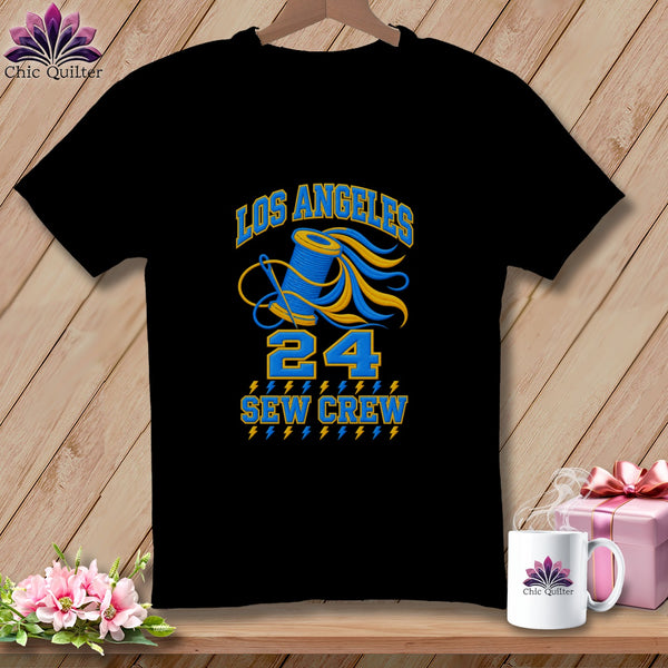A black crewneck t-shirt featuring a blue and yellow graphic with the text Los Angeles 24 Sew Crew.