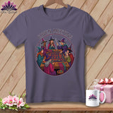 T-shirt with witches gathered around a quilt, text reads 