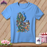 Light blue t-shirt with a peacock and quilting supplies graphic.