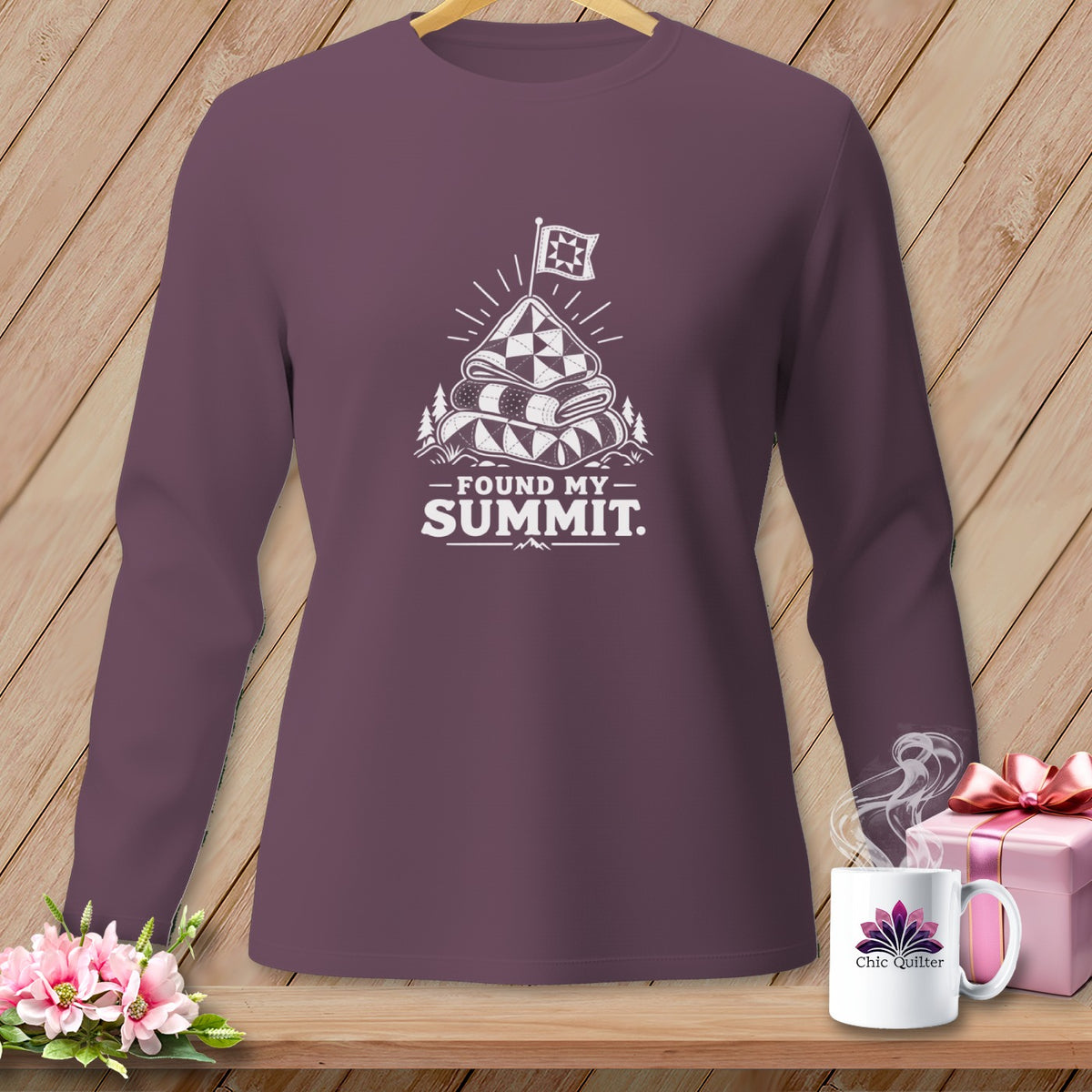 Purple long sleeve shirt with a stacked quilt design and "Found My Summit" text.