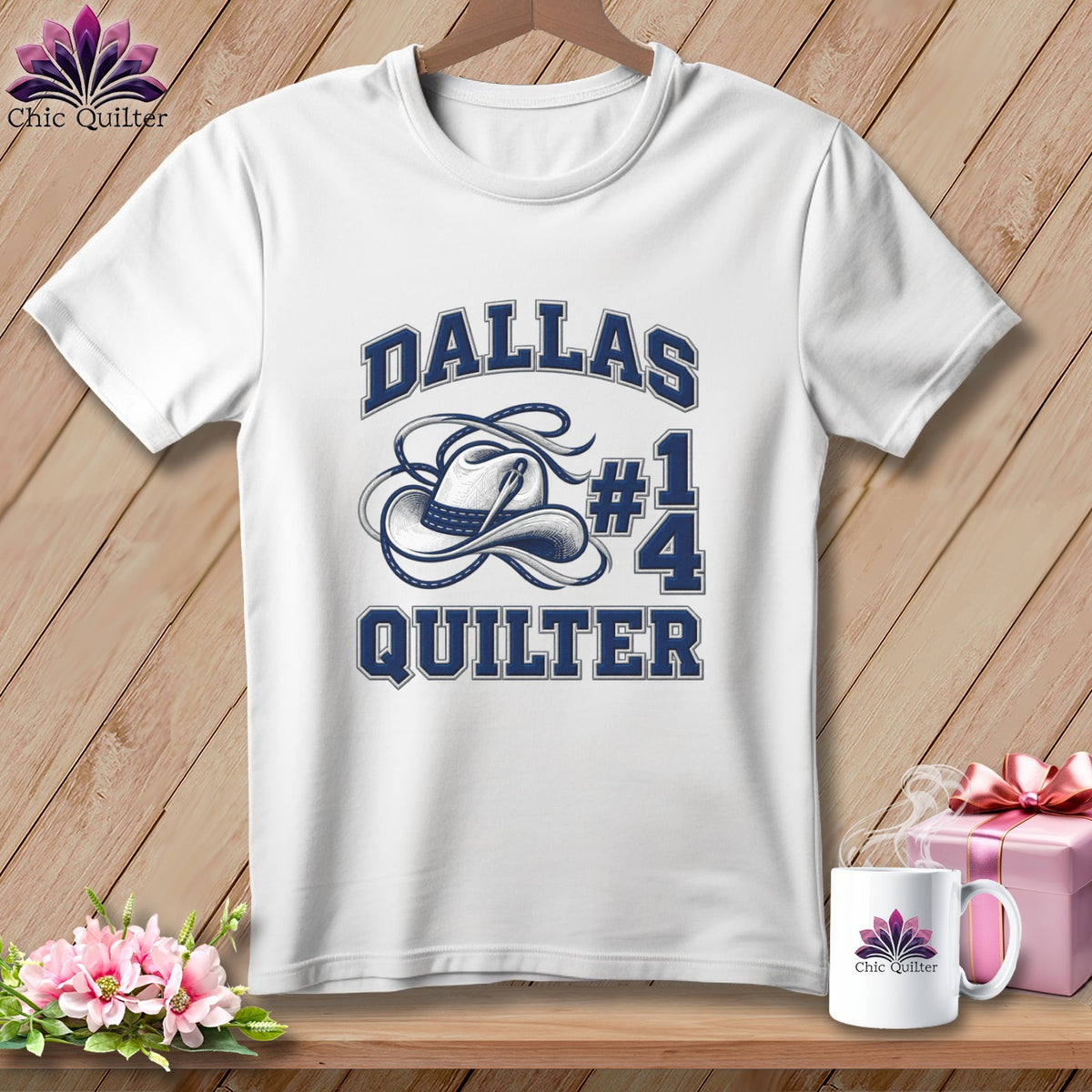 White crewneck t-shirt featuring a blue graphic with a cowboy hat and Dallas Quilter text.