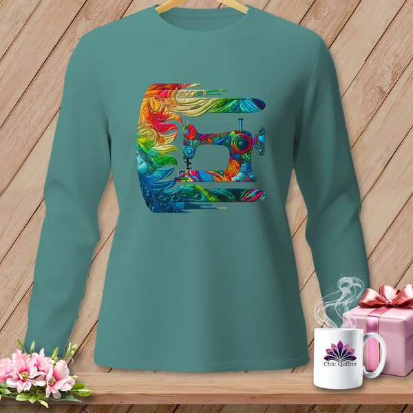 Teal long-sleeve shirt with colorful rainbow sewing machine graphic.