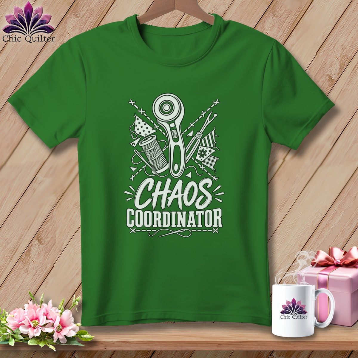 Green t-shirt with "Chaos Coordinator" and sewing tools graphic.