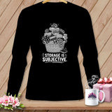 Black long-sleeve shirt with a basket of fabric and text 