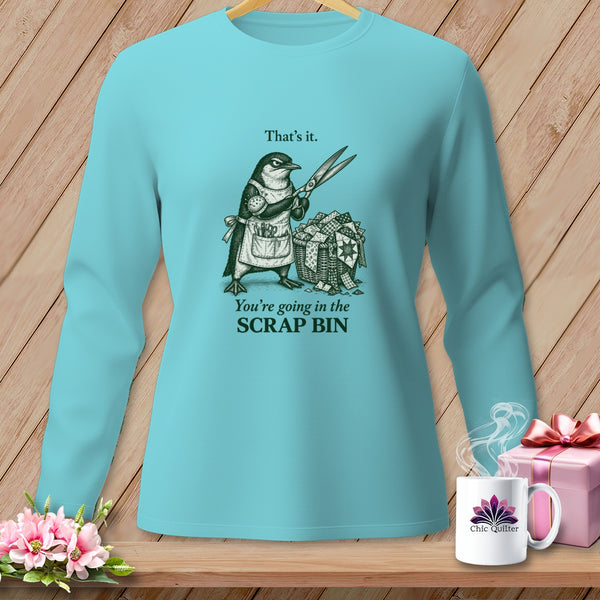 Teal long-sleeve shirt with a penguin holding scissors over a scrap bin.