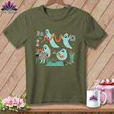 Ghosts sewing and quilting on a khaki t-shirt with a wooden background.