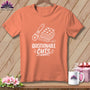 Peach t-shirt with white graphic of rotary cutter and fabric, reading "Questionable Cuts."