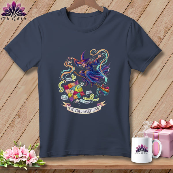 Navy t-shirt with a witch flying over quilting items, reading "I'VE TRIED EVERYTHING."