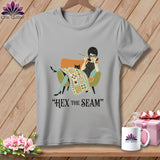 Gray t-shirt with illustration of a woman and cat and text 
