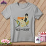 Gray t-shirt with illustration of a woman and cat and text "HEX THE SEAM".