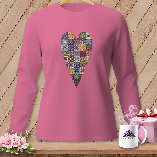 Pink long-sleeve shirt with a colorful patchwork heart graphic.