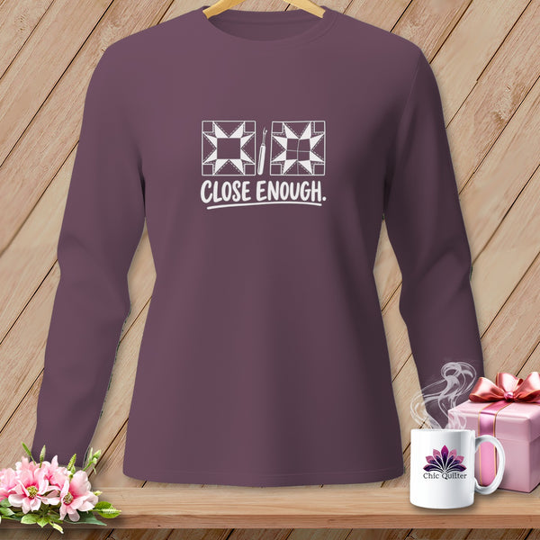 Long sleeve plum shirt with quilting graphic and "CLOSE ENOUGH." text.