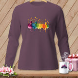 Long-sleeve purple shirt with colorful sewing notions graphic and Chic Quilter logo.