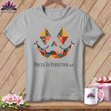 Gray t-shirt with a patchwork jack-o'-lantern face and 