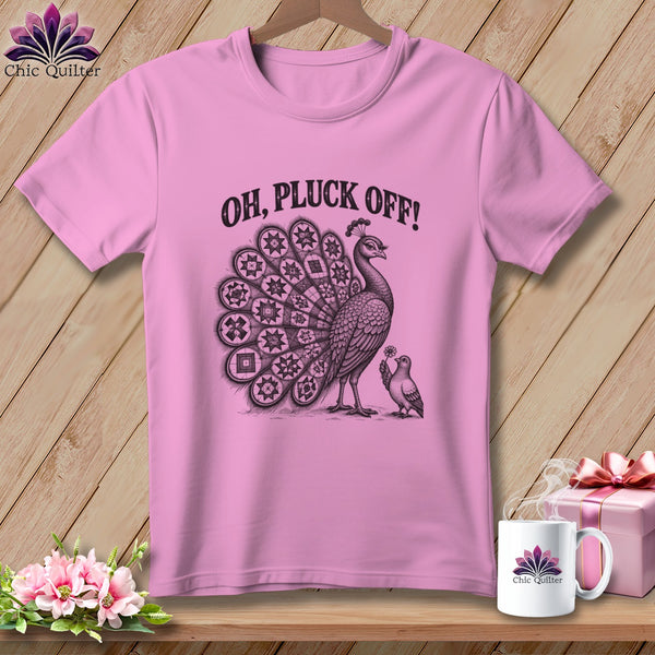 Pink t-shirt with a vintage illustration of a peacock, a smaller bird, and the text OH, PLUCK OFF!