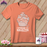 T-shirt with a basket of folded fabrics and the text 