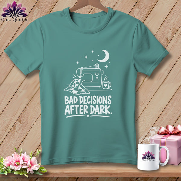 Teal t-shirt with white graphic of sewing machine, quilt, and text "Bad Decisions After Dark."