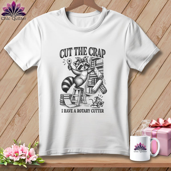 T-shirt with raccoon holding rotary cutter and text "CUT THE CRAP I HAVE A ROTARY CUTTER."
