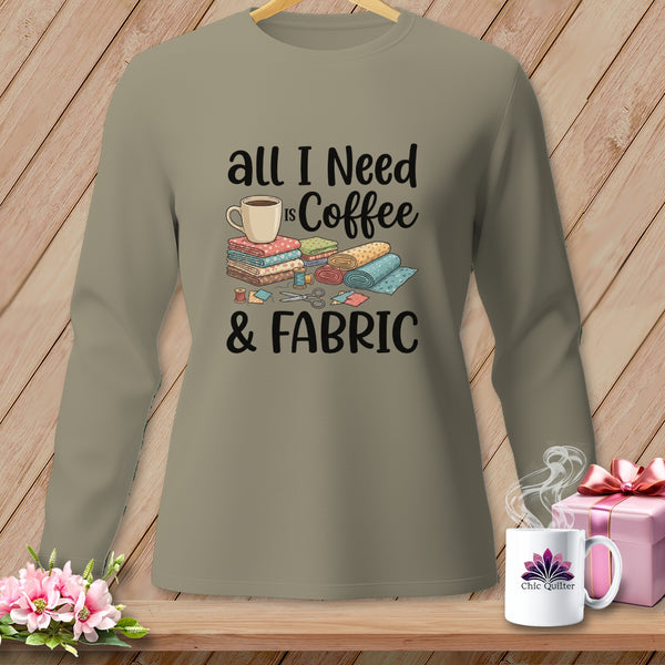Long sleeve shirt with text "all I Need is Coffee & FABRIC" and sewing supplies.