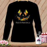 Black long-sleeve shirt with patchwork jack-o'-lantern face and text 