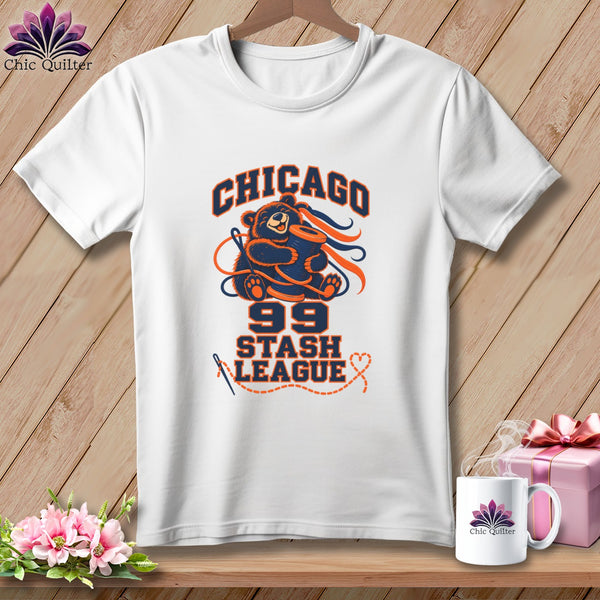 A white t-shirt features a graphic with a bear holding a spool of thread and the text "Chicago Stash League 99".