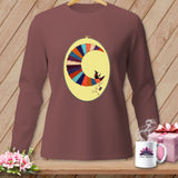 Long-sleeve shirt with a crescent moon embroidery featuring a witch and sewing spool.