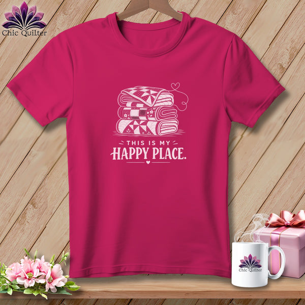 Pink t-shirt with stacked quilts graphic and text "THIS IS MY HAPPY PLACE."