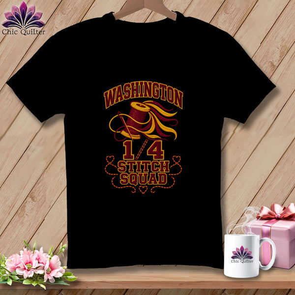 Black t-shirt featuring yellow and red "Washington 1/4 Stitch Squad" embroidery graphic on a wooden background.