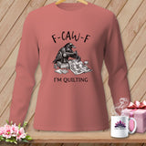 Long-sleeve shirt with crow sewing a quilt, text 