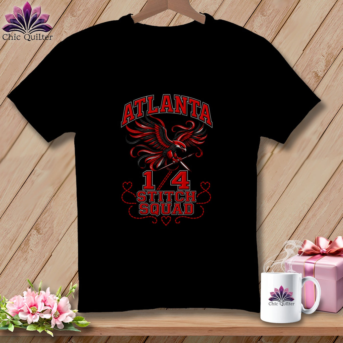 Black t-shirt featuring a red eagle graphic, Atlanta text, and Stitch Squad lettering with quilting scissors.