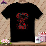 Black t-shirt featuring a red eagle graphic, Atlanta text, and Stitch Squad lettering with quilting scissors.