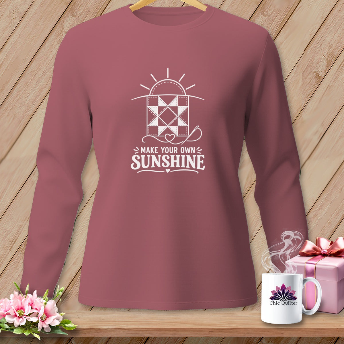 Long-sleeve shirt with "Make Your Own Sunshine" quilt graphic and coffee mug.