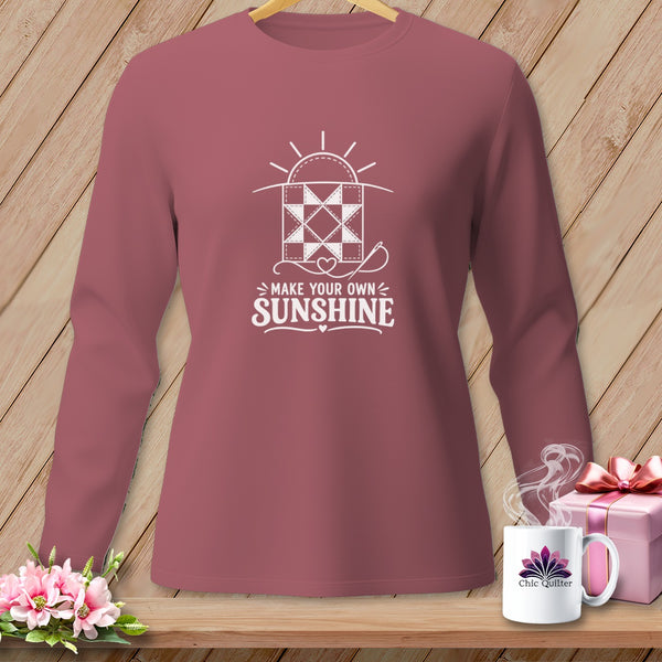 Long-sleeve shirt with "Make Your Own Sunshine" quilt graphic and coffee mug.