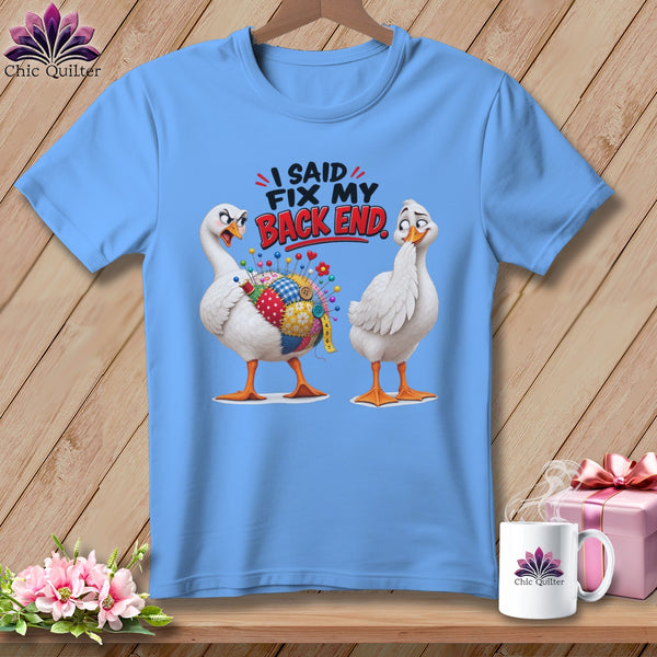 Light blue t-shirt with two ducks and the text "I SAID FIX MY BACK END."