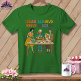 Green t-shirt with skeletons quilting and sewing, text 