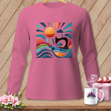 Pink long-sleeve shirt with a colorful sewing-themed graphic featuring a sun, sewing machine, and waves.