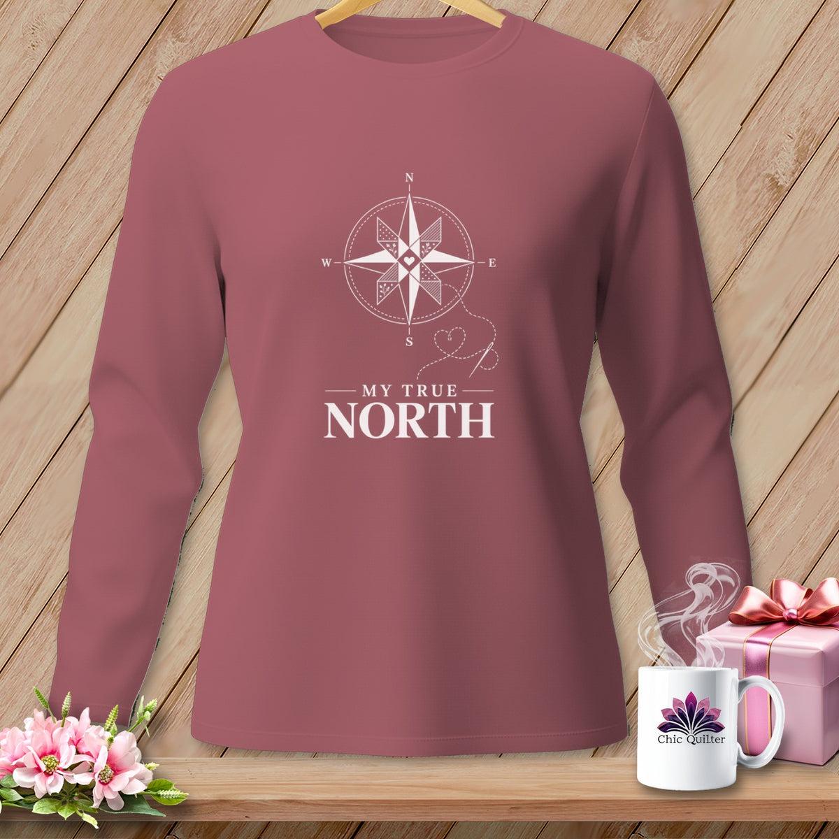 Maroon long-sleeve shirt with compass design and "My True North" text.